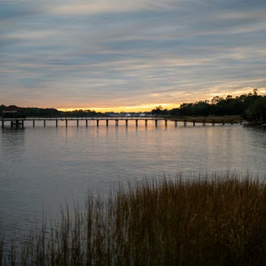 SC waterway at sunset with long dock